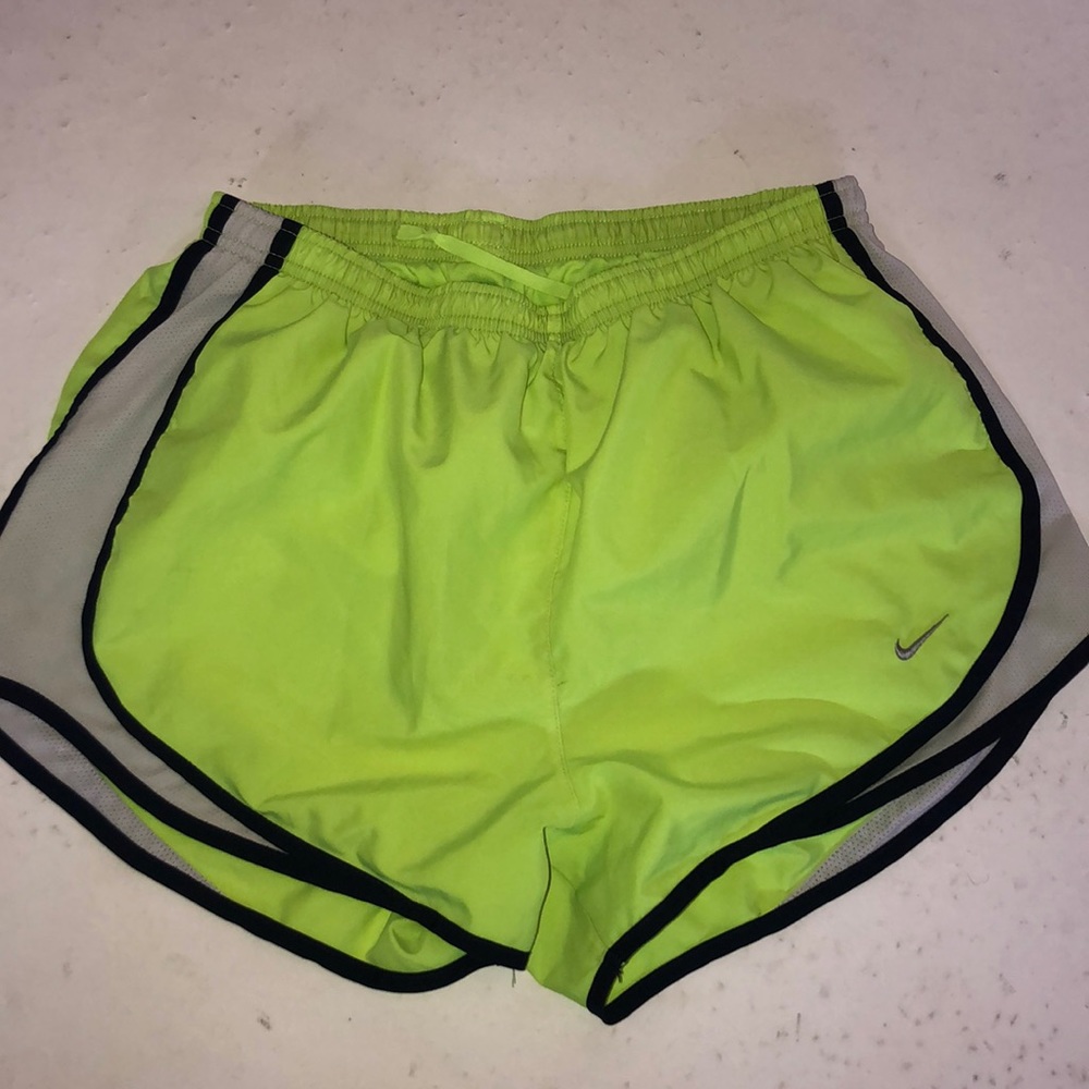 Neon yellow Nike running shorts